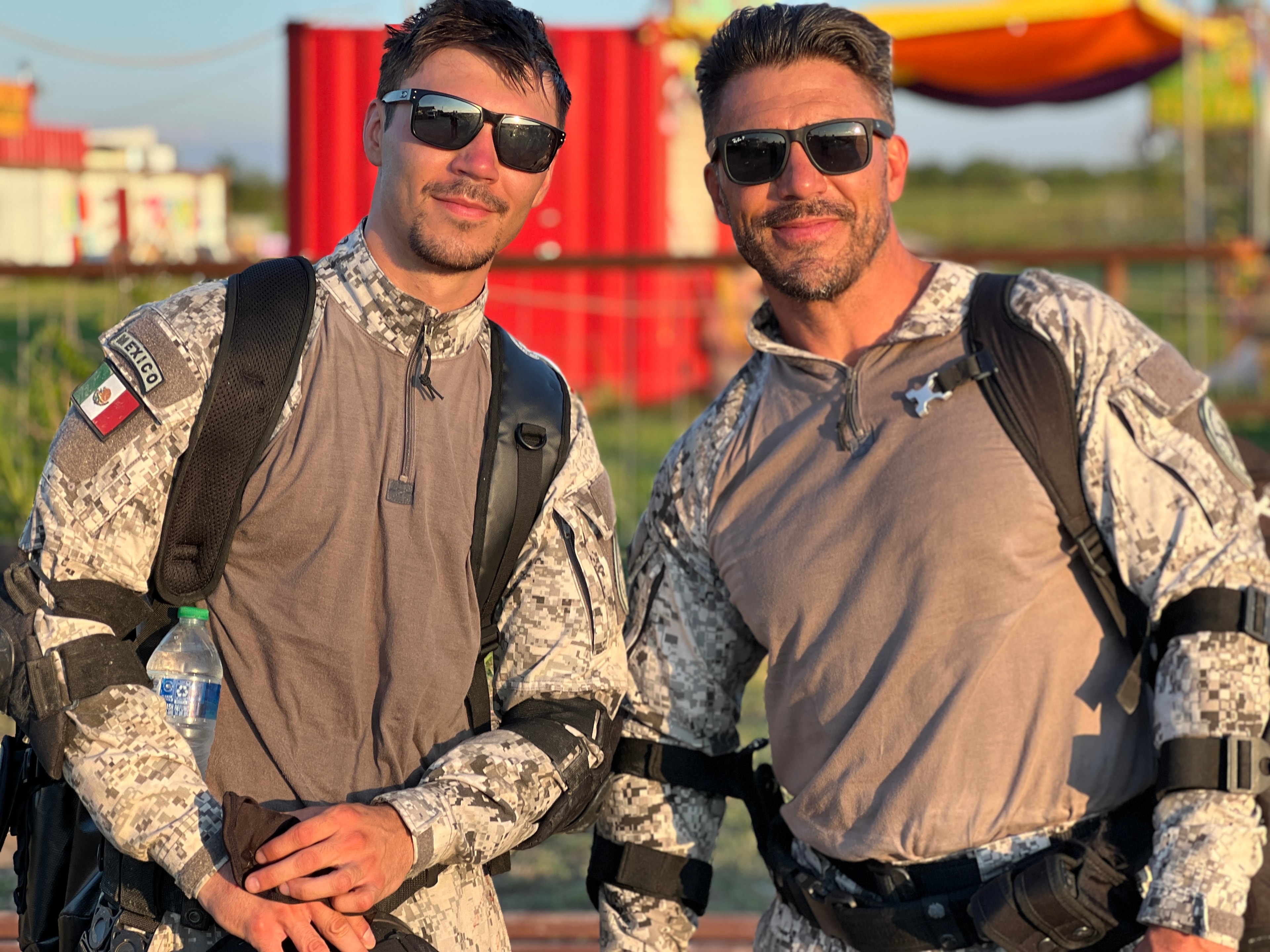 Two men in tactical gear on set