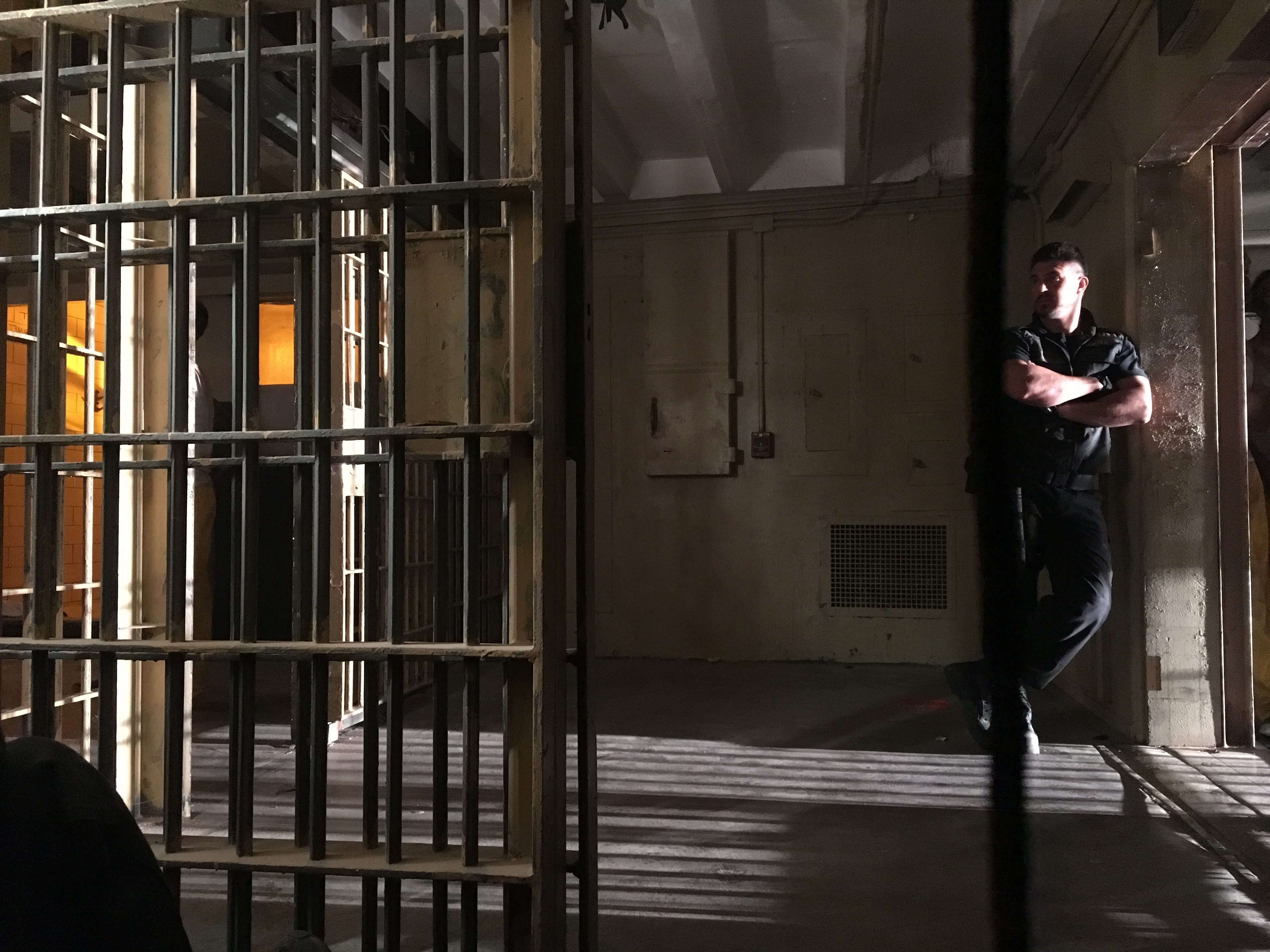 Chad Guerrero in character on set — prison scene